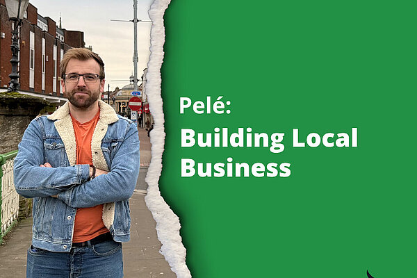 Pele: building local business, as he stands strong next to these words